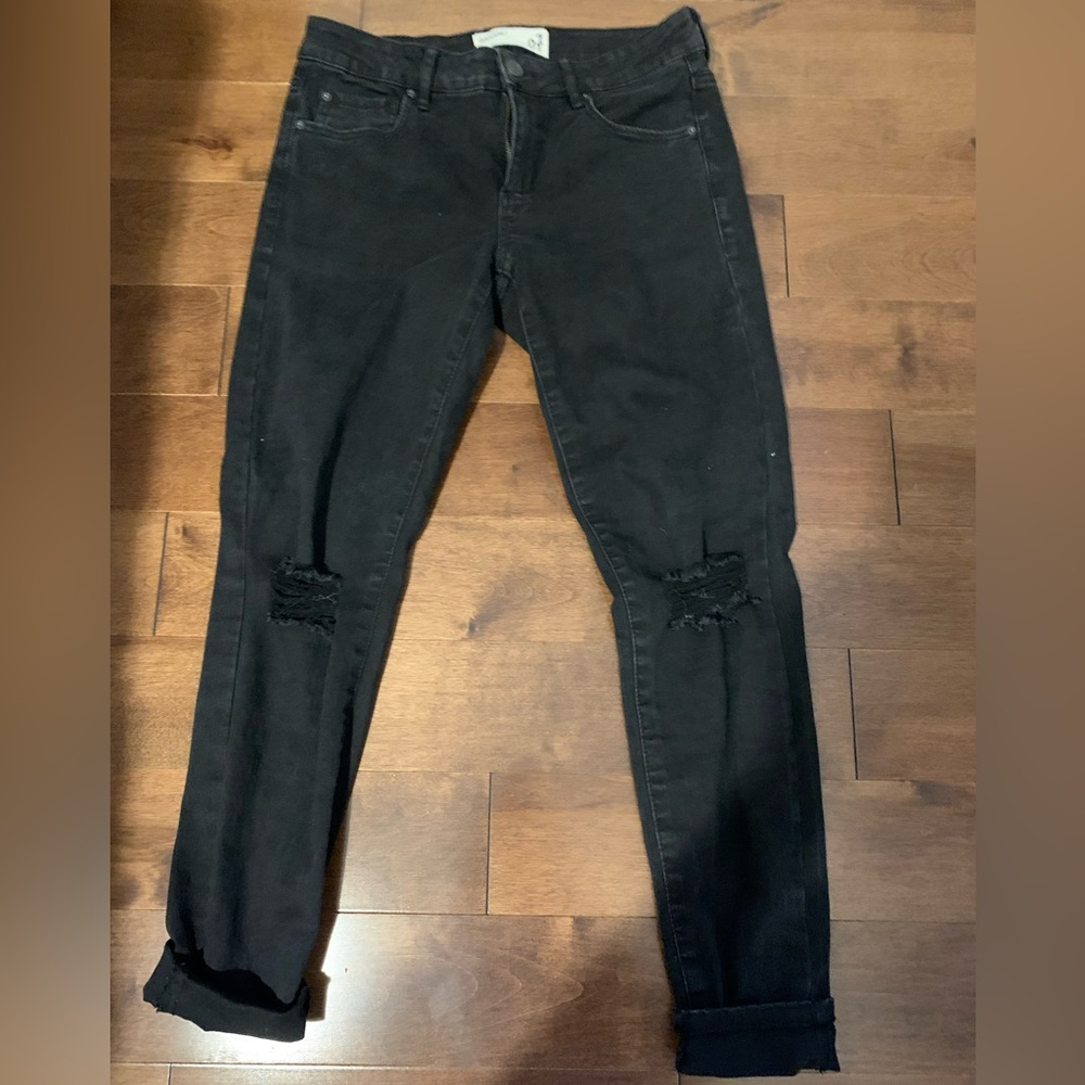 Garage black ripped jeans on the knees